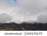 amazing mountains between clouds - european nature- mountains landscaspe - alpine landscsape - austrian alps