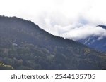 amazing mountains between clouds - european nature- mountains landscaspe - alpine landscsape - austrian alps