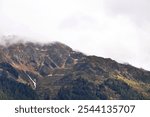 amazing mountains between clouds - european nature- mountains landscaspe - alpine landscsape - austrian alps