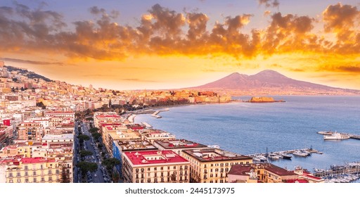 amazing Naples landscape of Vomero hill with beautiful streets and buildings of Napoli city, blue sea gulf and volcano Vesuveus with sunset of sunrise cloudy sky on background - Powered by Shutterstock