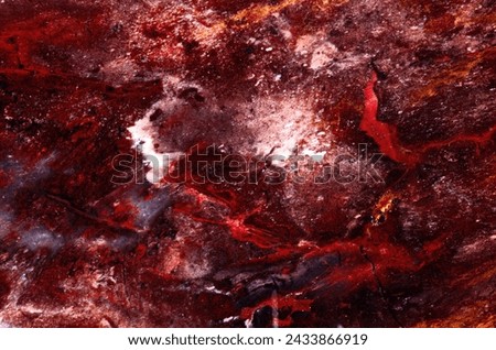 Amazing natural patterns and textures of slice of multicolored jasper mineral as a background. Natural stone surfaces and backgrounds. Colored semi-precious stones. Beautiful color spots.