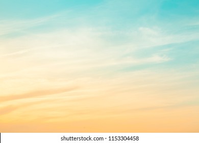 Amazing Nature sky background, texture for Design. Beautiful morning sky at dawn in the rays of the sun. Pastel cloudscape. Soft Wallpaper or Web banner With Copy Space