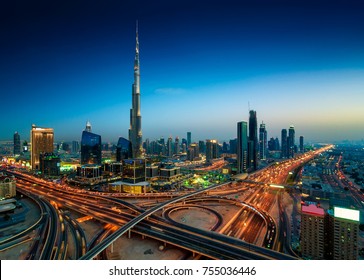Amazing night dubai downtown skyline. Colorful summer sunset. Panorama of business area with tallest skyscraper of the world. Dubai, United Arab Emirates