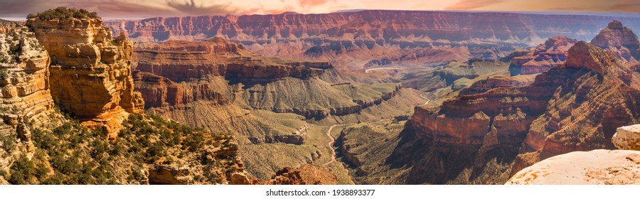 Amazing pano view of the Grand Canyon from the south rim.  The convoluted gorge formed over millions of years by the Colorado River (visiable in this image), erosion, and gravity.  Incredible vista!  - Powered by Shutterstock