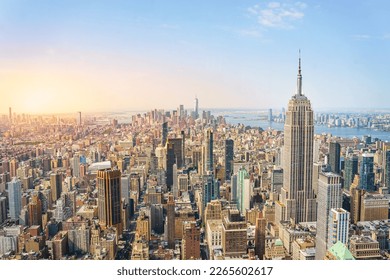 Amazing panorama view of New York city skyline and skyscraper at sunset. Beautiful cityscape in Midtown Manhattan. Copy space for text.