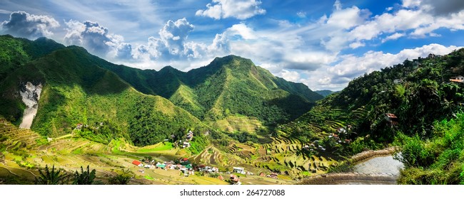 Amazing panorama view of rice terraces fields in Ifugao province mountains under cloudy blue sky. Banaue, Philippines UNESCO heritage - Powered by Shutterstock