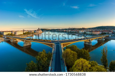 Amazing panoramic phot about the Margaret bridge in Budapest Hungary. Evening mood, popular touris attraction a river cruise in this time. panoramic view