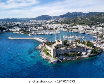 Amazing panoramic view from drone of beautiful full of yachts Bodrum harbour and ancient Kalesi castle in Mugla province in Turkey