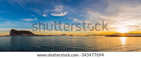 Amazing panoramic view on the rock of Gibraltar during sunset and the ships around it.