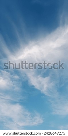 Amazing pattern of milky white clouds in summer season viberant blue sky 