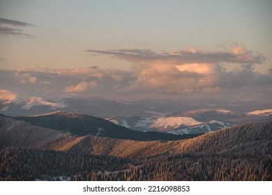 Amazing Picturesque Landscape Scene View Of Sky And Grey Clouds And Winter Mountain Landscape With Snow Covered Evergreen Trees