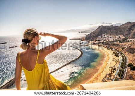 Amazing place to visit. Woman looking at the landscape of Las Teresitas beach and San Andres village, Tenerife, Canary Islands, Spain. Tourism. Vacation. Travel.