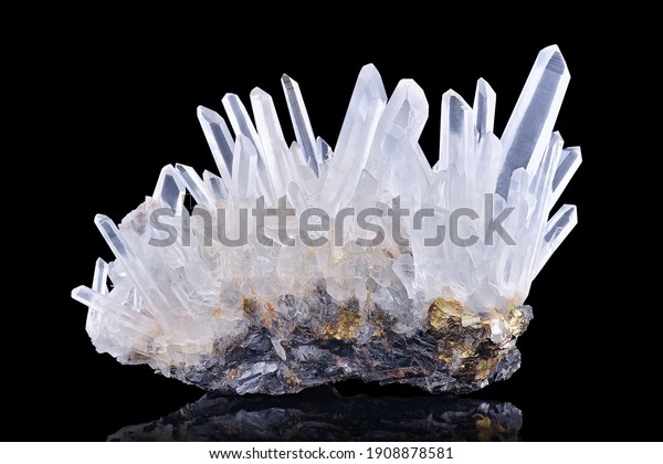 Amazing pure Quartz Crystal cluster\
gemstone closeup macro isolated on black background. Natural rare\
white mineral rough stone. Beautiful crystals\
arrangement