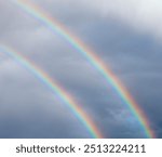 amazing rare double rainbow with many colors auspicious sign and lucky charm after storm