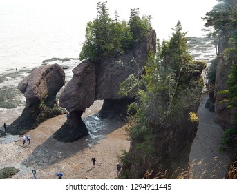 Amazing Rock Formations At Hopewell Rocks In The Bay Of Fundy In New Brunswick, Canada. Extremely Low Tides Let People Walk On Ocean Floor.