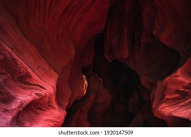 Amazing Sandstone Formations Inside A Caves In Famous Grand Canyon And Antelope Canyon, USA. Vibrant Red Colors Of Eroded Rock. Abstract Wave Forms Texture.