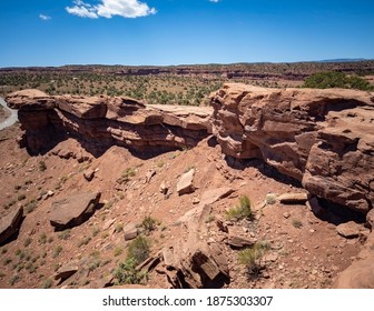 Amazing Sandstone Monoliths In A Barren Desert Prairie On A Blue Partly Cloudy Summer Day At Capitol Reef National Park In Torrey Utah