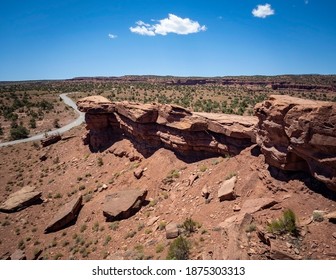 Amazing Sandstone Monoliths In A Barren Desert Prairie On A Blue Partly Cloudy Summer Day At Capitol Reef National Park In Torrey Utah