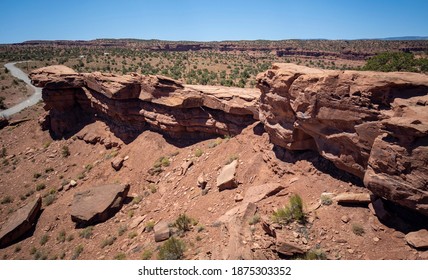 Amazing Sandstone Monoliths In A Barren Desert Prairie On A Blue Partly Cloudy Summer Day At Capitol Reef National Park In Torrey Utah