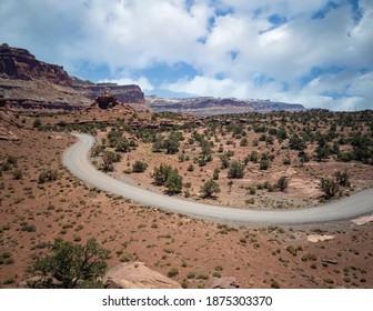 Amazing Sandstone Monoliths In A Barren Desert Prairie On A Blue Partly Cloudy Summer Day At Capitol Reef National Park In Torrey Utah