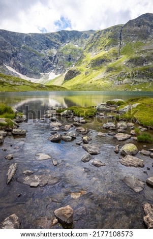 Amazing shot of Seven Rila lakes, Bulgaria. Great natural photo with dramatic sky above the lakes and peaks.