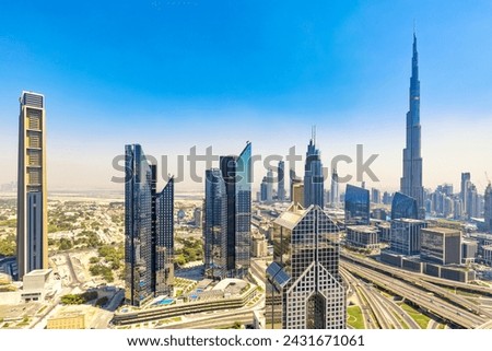 Amazing skyline cityscape with modern skyscrapers. Downtown of Dubai at sunny day, United Arab Emirates