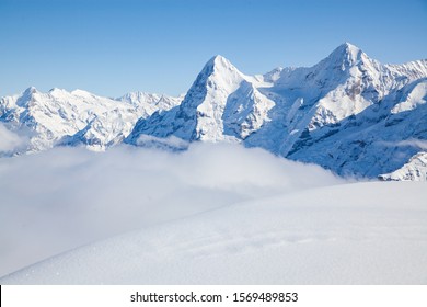 amazing snow covered peaks in the Swiss alps Jungfrau region from Schilthorn - Powered by Shutterstock