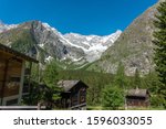 Amazing snowy mountain summit views from the small Swiss village La Fouly in the Swiss Alps, on the Tour de Mont-Blanc trail, Orsieres, Switzerland