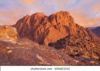 Amazing Sunrise at Sinai Mountain, Mount Moses with a Bedouin, Beautiful view from the mountain	 - Shutterstock ID 1056651515