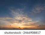 Amazing sunset skyscape. Evening sky with bright colorful orange and yellow clouds