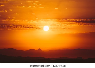 Amazing Sunset Sunrise With Sun Over Dark Mountain Ground Silhouette