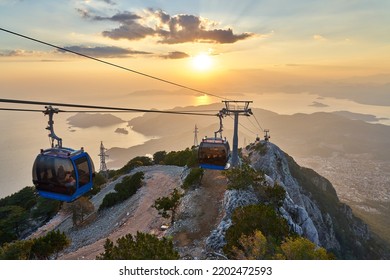 Amazing sunset time at Babadag. Teleferik cable cars are used to reach to peak of mountain. Fethiye, Mugla, Turkey.  - Powered by Shutterstock