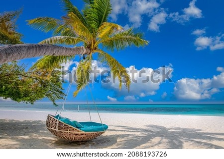 Amazing tropical beach seaside background as summer landscape with beach swing or hammock and white sand and calm sea, sunny beach shore banner. Luxury beach scene vacation and summer holiday island
