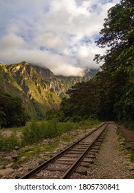 Amazing Vertical Landscape Of Mountain With Sunrise Colours From Golden Hour And Blue Sky With Clouds And A Trail Rail In A Hike Trail Travel Near Machu Pichu, In Cusco, Peru