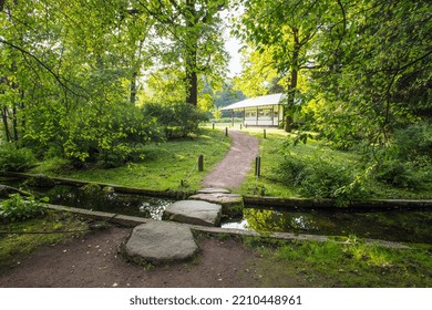 Amazing View Of Autumn In  Japanese Garden In  Moscow - Teahouse And Stream With Stepping Stones   And Yellow (orange) Autumn Nature  And Reflection In Stream  And Garden Path To Tea House ( Pavilion)