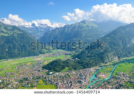 Amazing view of Interlaken and adjacent mountains photographed from the top of Harder Kulm, Switzerland. Swiss Alps. Beautiful landscapes. Amazing landscape. Jungfrau, river
