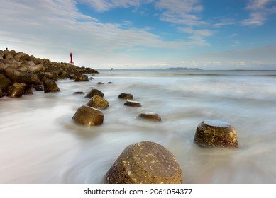 Amazing View ,lght House And Breakwater At Chendering Beach, Located In Terengganu, Malaysia. Long Exposure Photography, Soft Focus Effect.