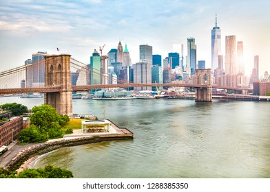 Amazing View Of New York City Skyline And Brooklyn Bridge With Skyscrapers And East River Flowing During Daytime In United States Of America