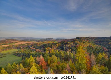 Amazing view from observation tower  into the beautiful autumn landscape. High dynamic range photograph of a forest in the middle of fall. The beauty of European nature - Shutterstock ID 1602417514