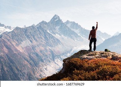 Amazing view on Monte Bianco mountains range with tourist on a foreground. Vallon de Berard Nature Preserve, Chamonix, Graian Alps. Landscape photography - Powered by Shutterstock