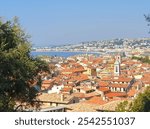 Amazing view on old Nice from the Colline du Chateau. Brown roofs on the traditional buildings. City panorama. French riviera, Nice. Cote d Azur