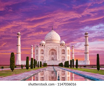 Amazing view on the Taj Mahal in sunset light with reflection in water. The Taj Mahal is an white marble mausoleum on the south bank of the Yamuna river. Agra, Uttar Pradesh, India