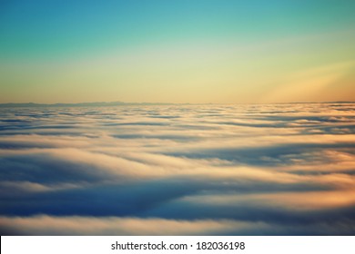 Amazing View From Plane On The Orange Sky, Sunset Sun And Clouds