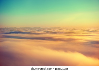 Amazing View From Plane On The Orange Sky, Sunset Sun And Clouds