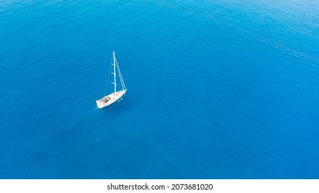 Amazing View To Yacht, Swimming Woman And Clear Water.