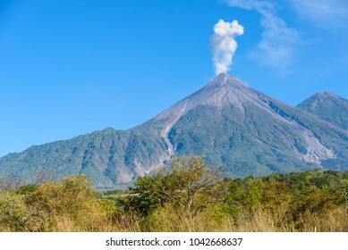 Amazing Volcano El Fuego During A Eruption On The Left And The Acatenango Volcano On The Right, View From Antigua, Guatemala