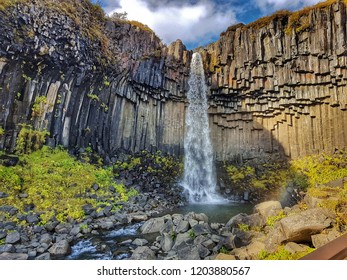 amazing waterfall in Iceland - Shutterstock ID 1203880567