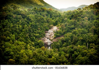 Amazing Waterfall Revealed Through Thick Green Jungle