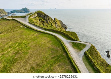 Amazing wave lashed Kerry Cliffs, widely accepted as the most spectacular cliffs in County Kerry, Ireland. Tourist attractions on famous Ring of Kerry route.