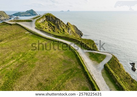 Amazing wave lashed Kerry Cliffs, widely accepted as the most spectacular cliffs in County Kerry, Ireland. Tourist attractions on famous Ring of Kerry route.